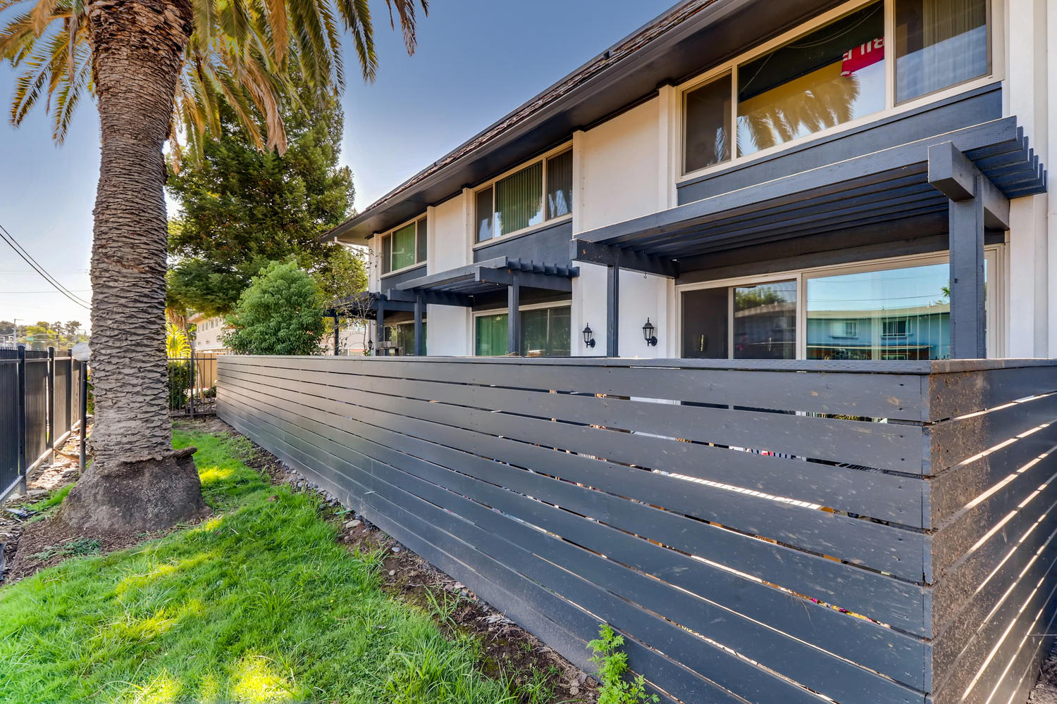 Exterior view of patio with privacy fence