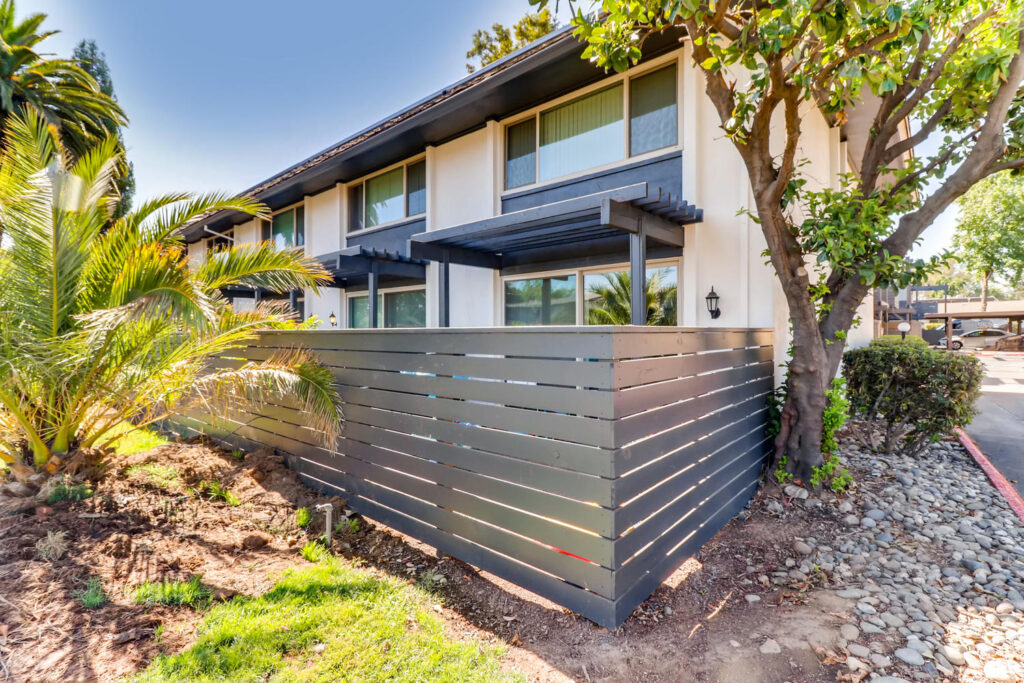 Exterior view of patio with privacy fence