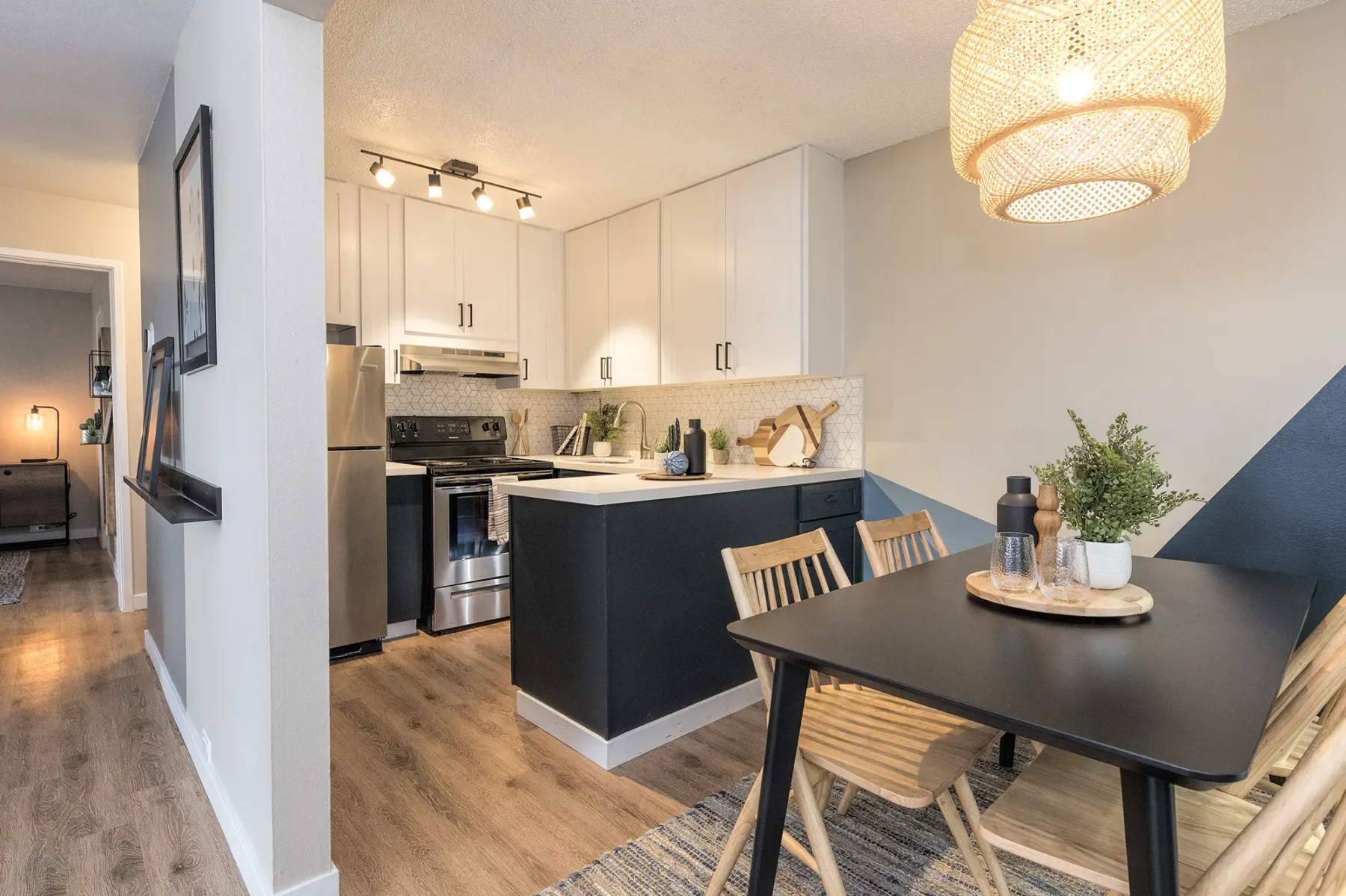 Kitchen with stainless steel appliances and tile back splash