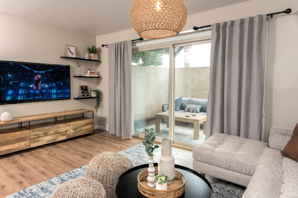 Living room and patio at Westwood apartments in Carmichael, CA